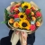 Букет "Ричи" из подсолнухов, альстромерий, гиперикума, роз, скиммии и диантусов в Можайске